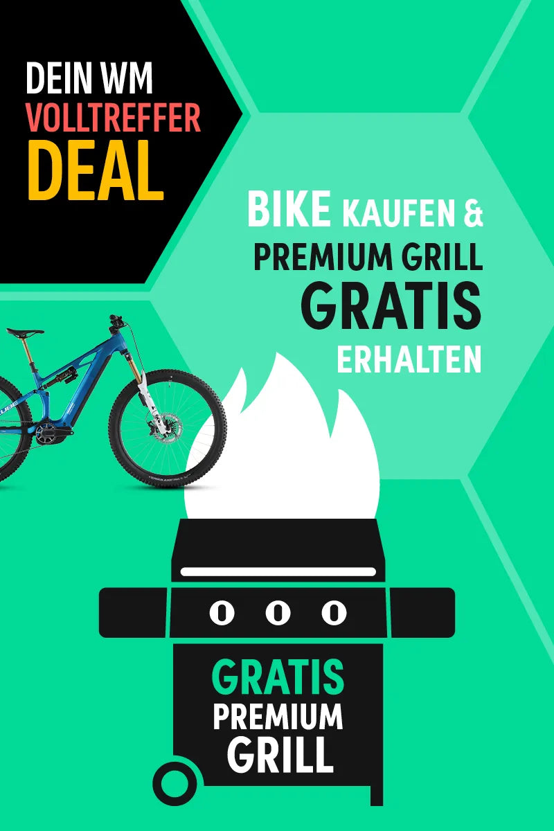 Promobild: Mountainbike und Gratis Premium Grill Aktion. Text: "Dein WM Volltreffer Deal. Bike kaufen & Premium Grill gratis erhalten."