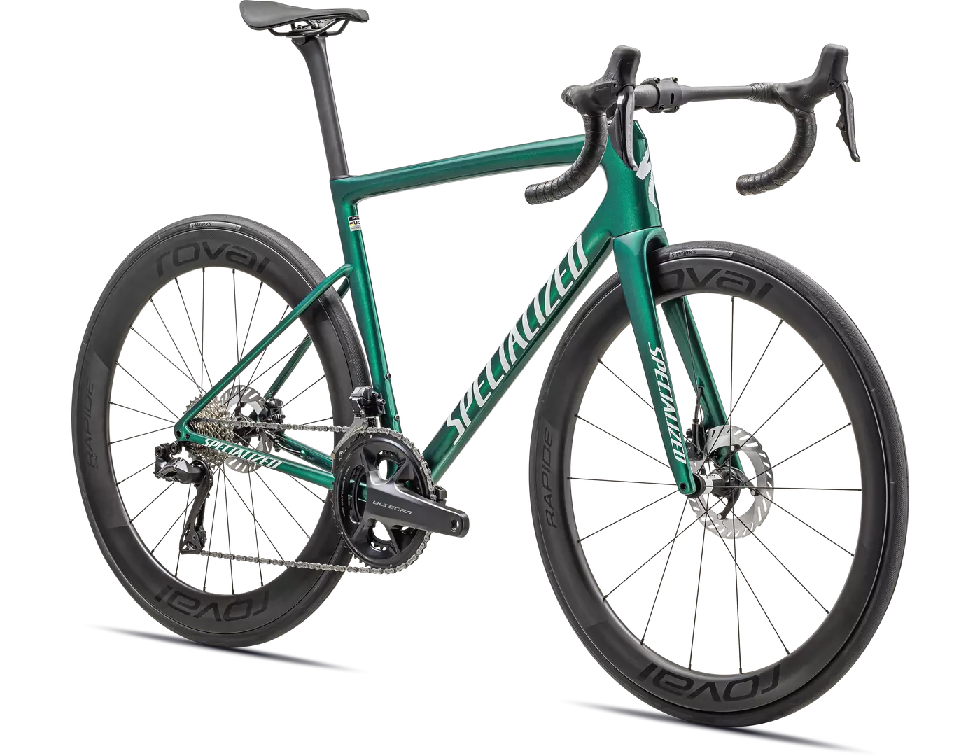 Grünes Specialized Tarmac Rennrad mit aerodynamischem Rahmen und Scheibenbremsen, ideal für ambitionierte Radfahrer.