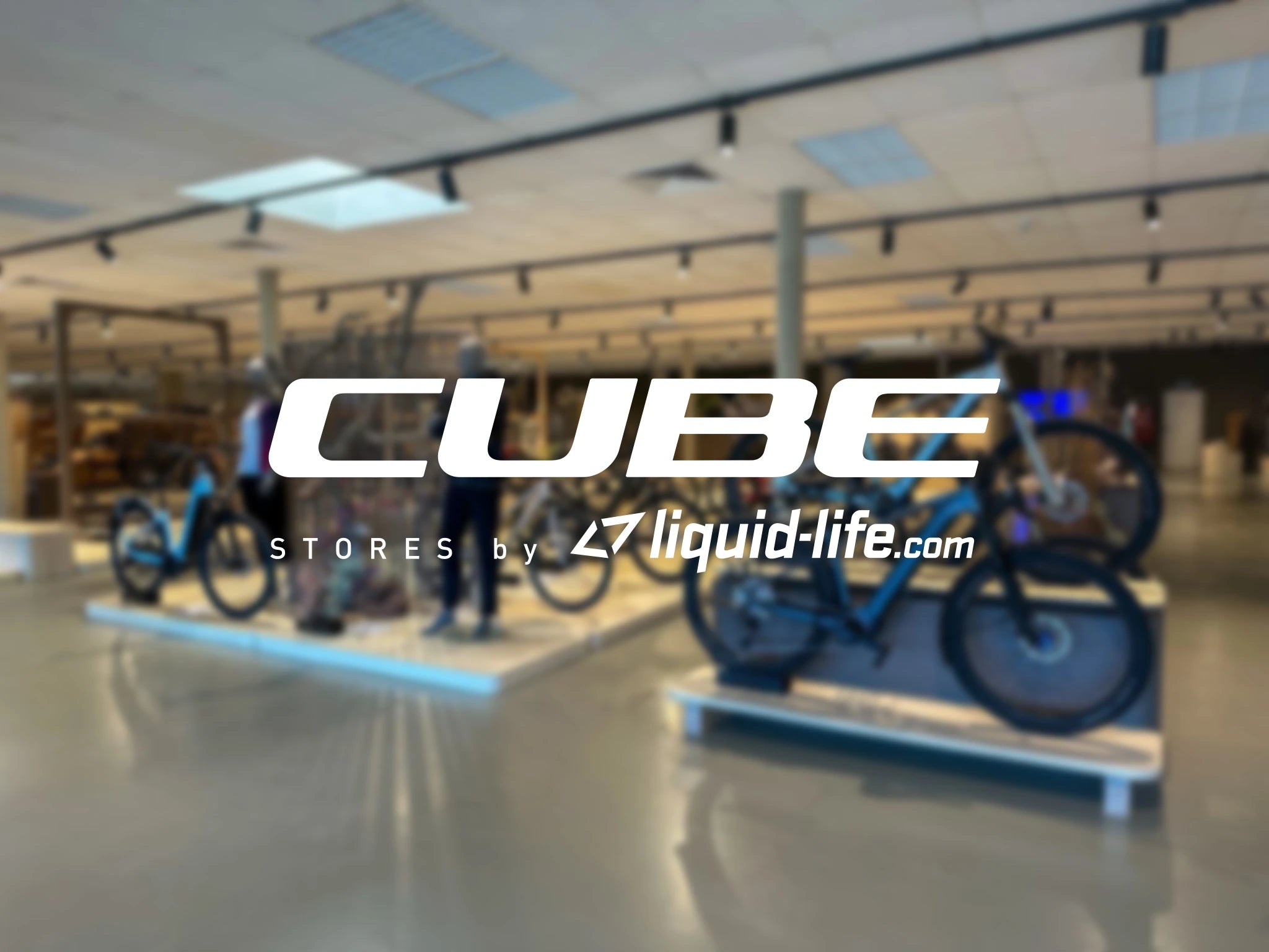 Fahrradgeschäft mit Cube Bikes, präsentiert von liquid-life.com, im modernen Shop-Design.