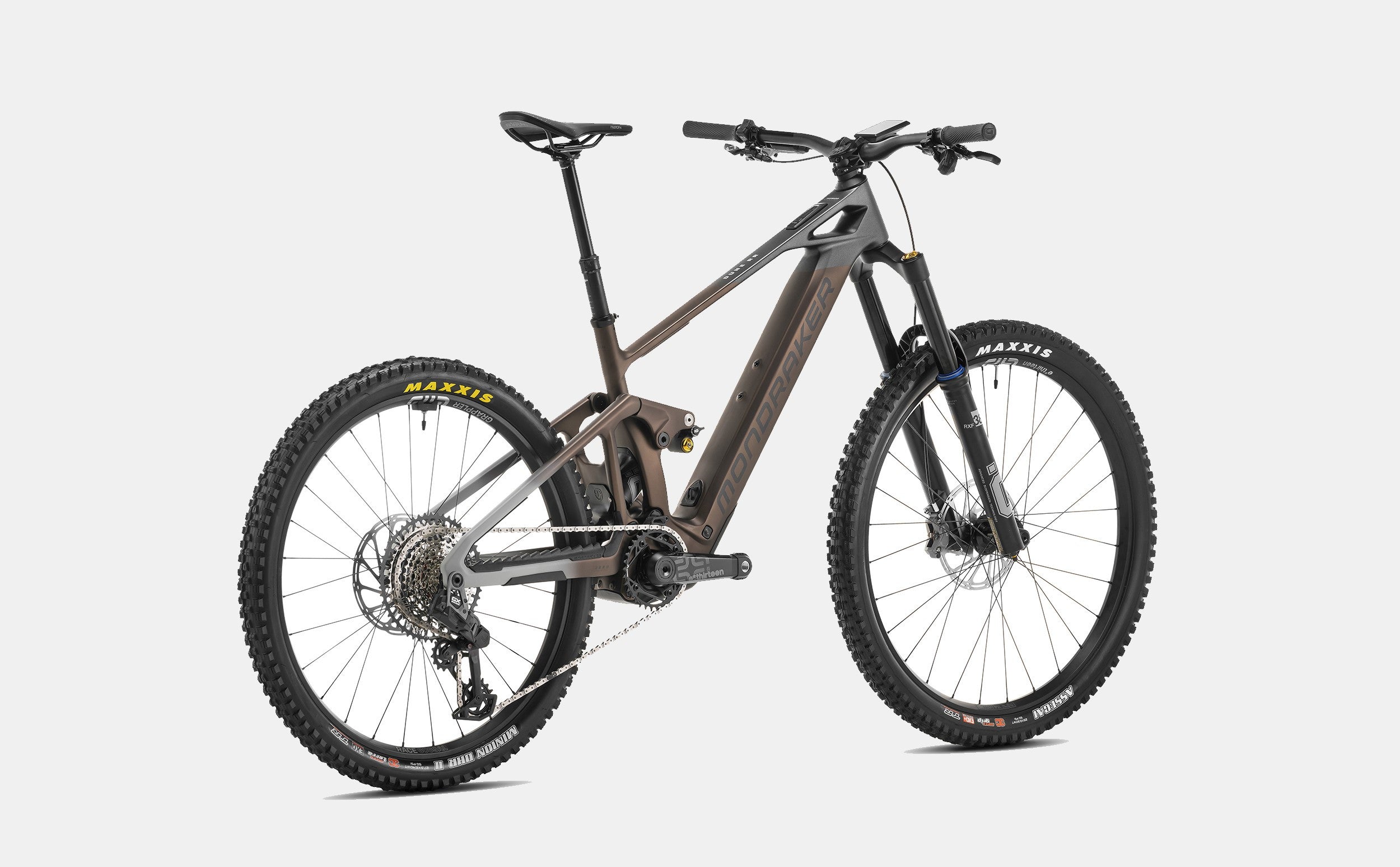Mondraker Dune Mountainbike, braun, robust für anspruchsvolles Gelände, ausgestattet mit Maxxis-Reifen.