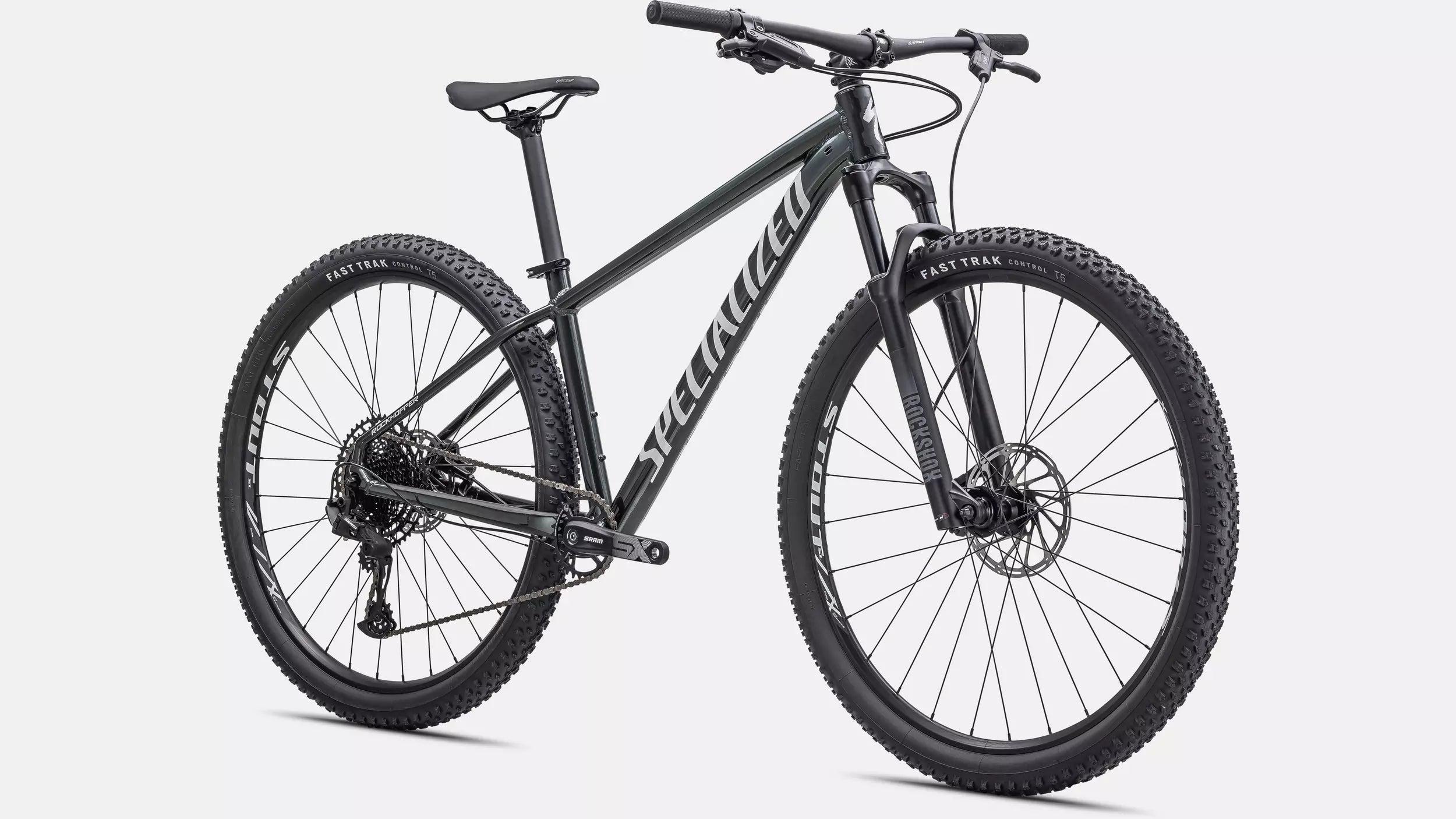 Specialized Rockhopper Mountainbike in Dunkelgrau mit hydraulischen Scheibenbremsen und griffigen Geländereifen.