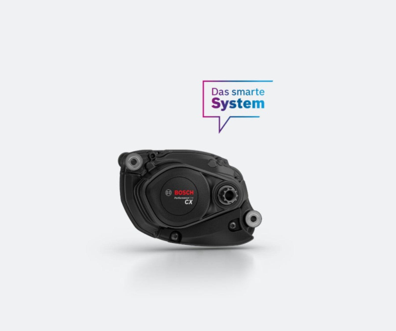 Bosch Performance Line CX E-Bike Motor, schwarz, mit dem Slogan "Das smarte System" im Hintergrund.