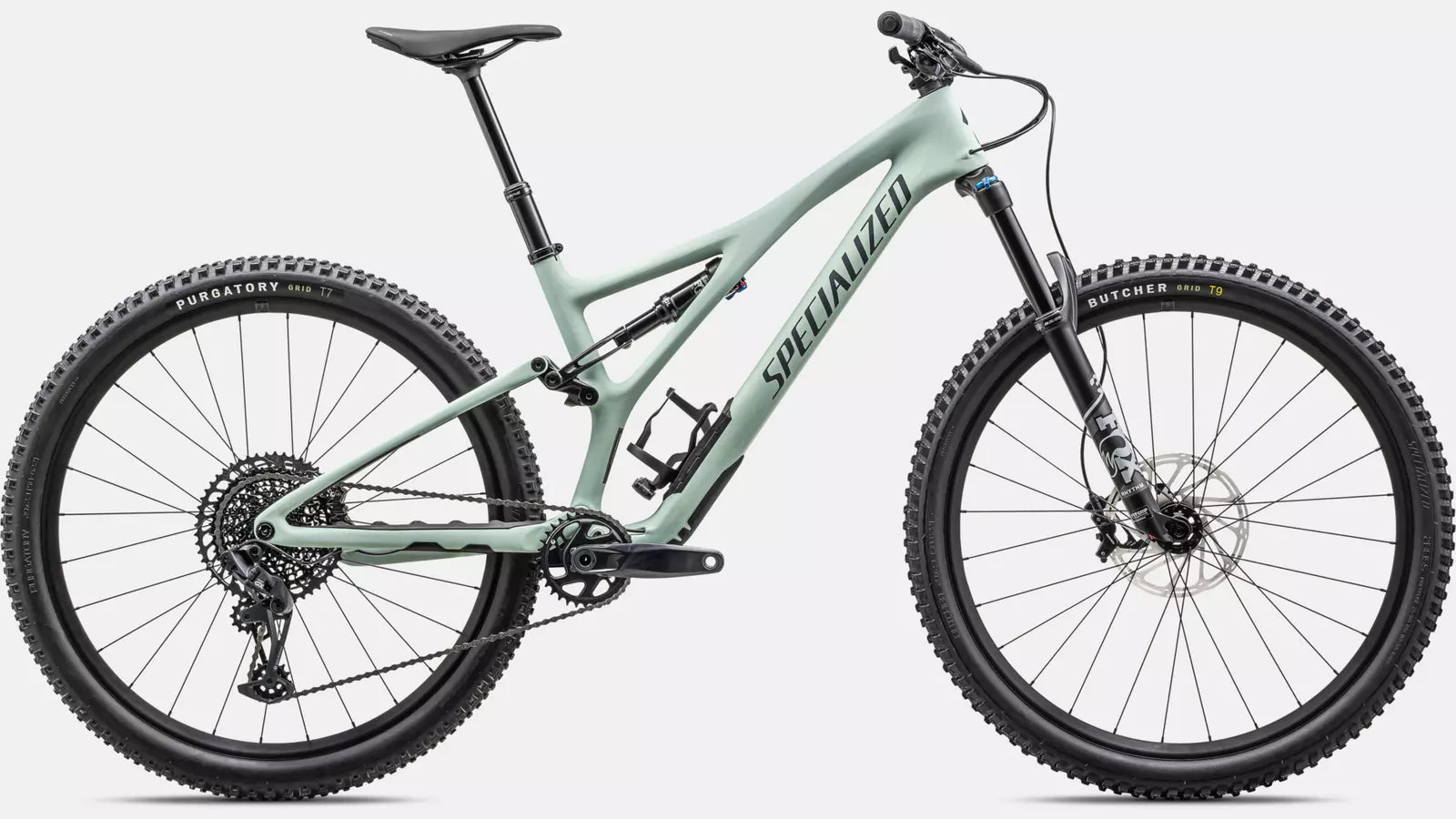 Specialized Stumpjumper Mountainbike in Hellgrün, vollgefedert, mit breiten Profilreifen, geeignet für Offroad-Abenteuer.